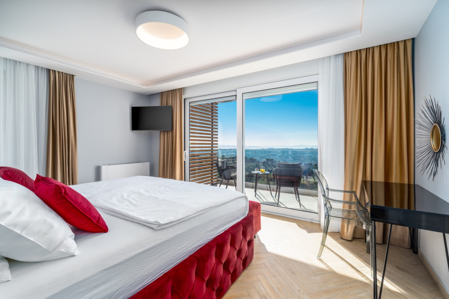 Bedroom No2 (south-east, with views on pool and town Split) with a king-size bed 180cm x 200cm