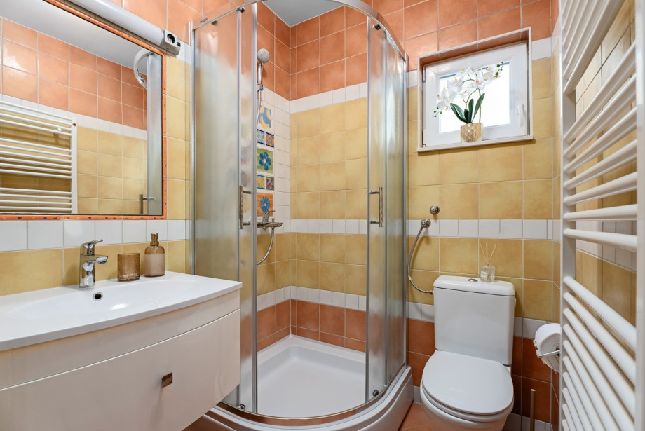 Convenient ground floor bathroom located near the living area.