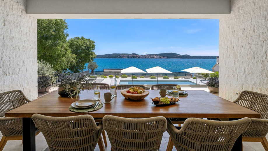 The outdoor lounge — for long, slow breakfasts by the sea
