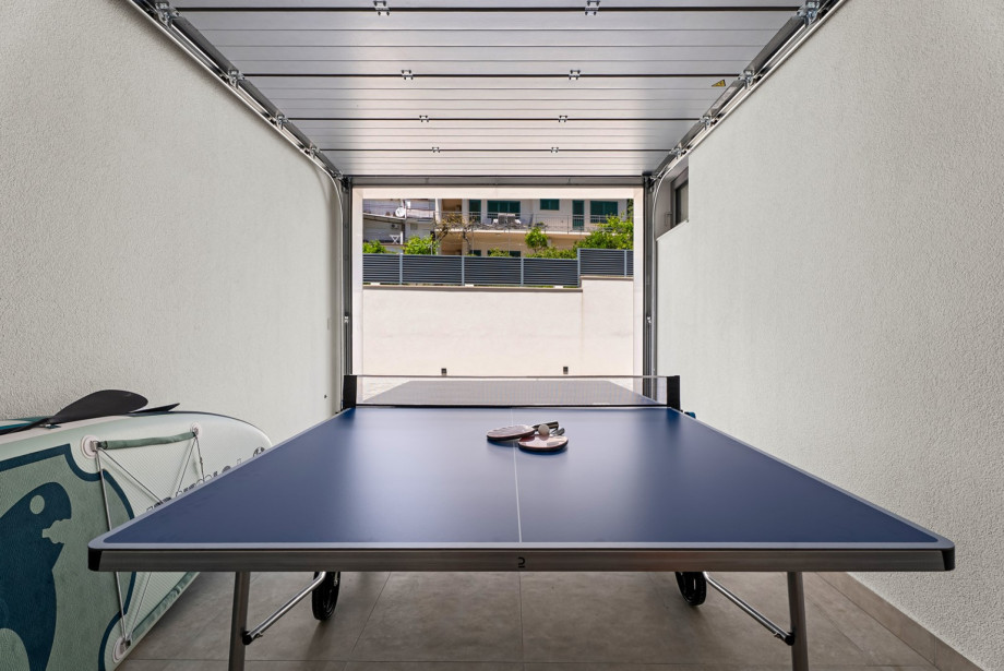 Private indoor ping pong area for fun and relaxation during your stay.