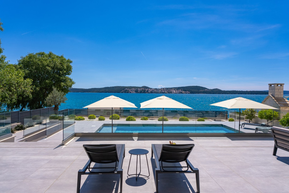 Luxury Villa Luminara is nestled in the Mediterranean landscape, where the turquoise sea meets your private sanctuary.