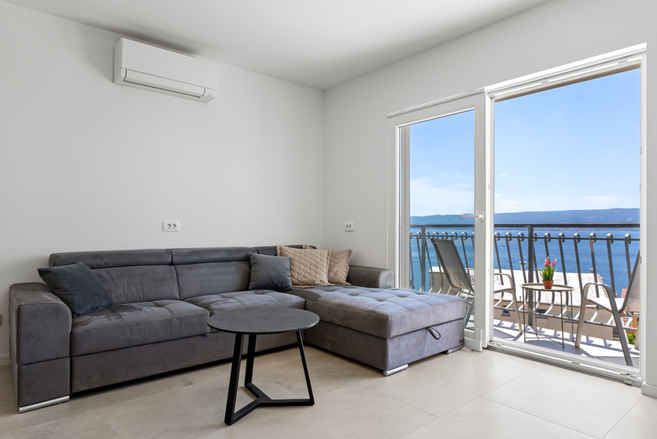 Living area with a comfortable sofa and a TV
