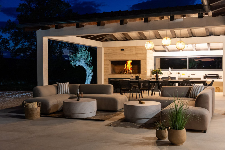 A covered outdoor dining space for up to 10 guests
