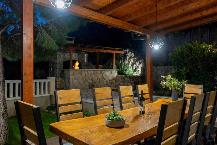 Outdoor dining area next to the grill