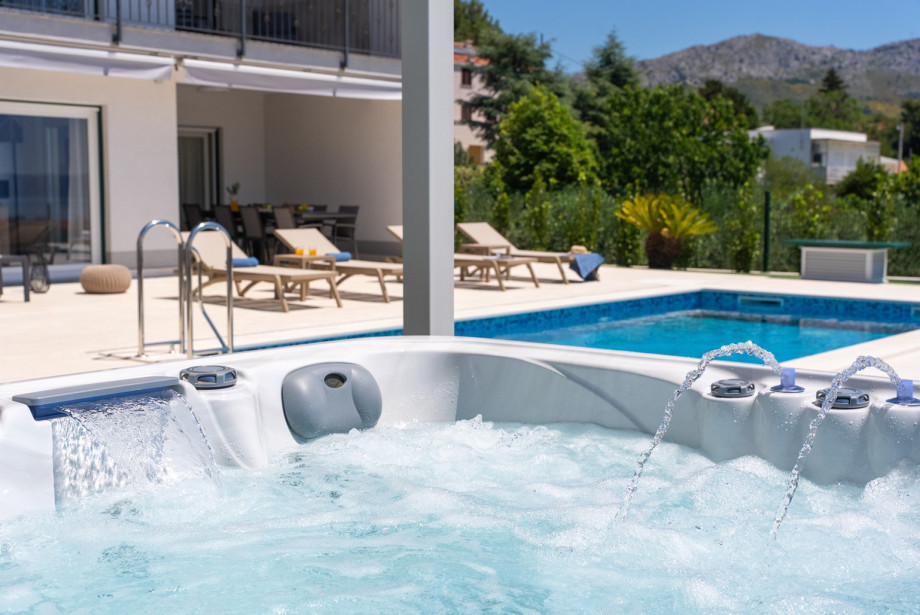 An outdoor hot tub offers a serene retreat after a day of exploration