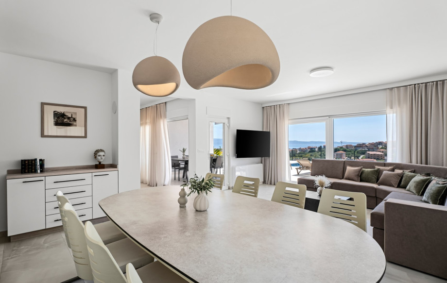 Comfortable dining area for 10 people with breathtaking sea views