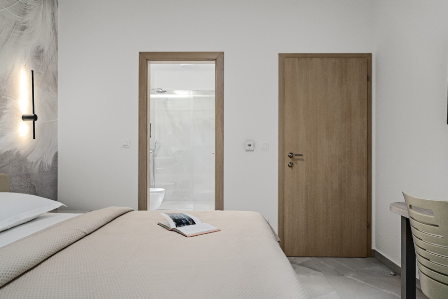 Bedroom No. 2 also offers a TV, air conditioning, and an en-suite bathroom