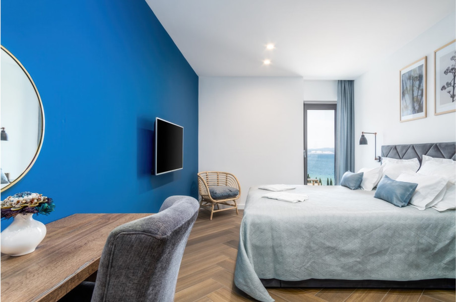 Bedroom No2 with a king-size bed 180 x 200cm, TV, A/C, en-suite bathroom with a shower, a balcony