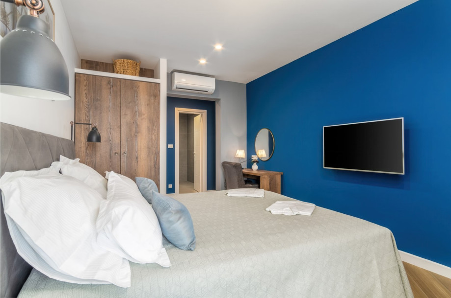 Bedroom No2 with a king-size bed 180 x 200cm, TV, A/C, en-suite bathroom with a shower, a balcony