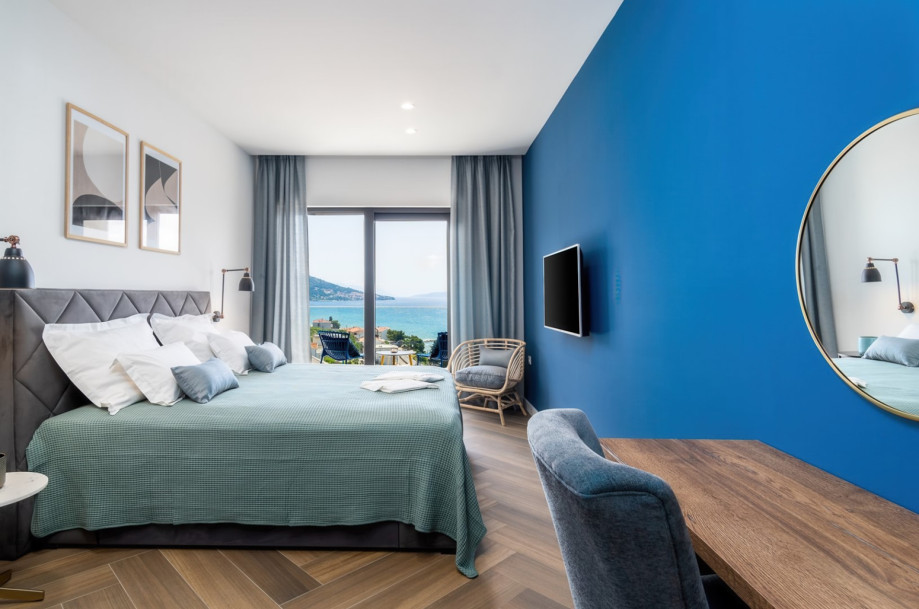 Bedroom No3 with a king-size bed 180x200cm, TV, A/C, en-suite bathroom with a shower, and a balcony