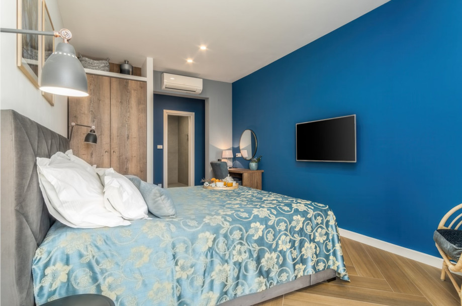 Bedroom No4 with a king-size bed 180 x 200cm, TV, A/C, en-suite bathroom with a shower, a balcony
