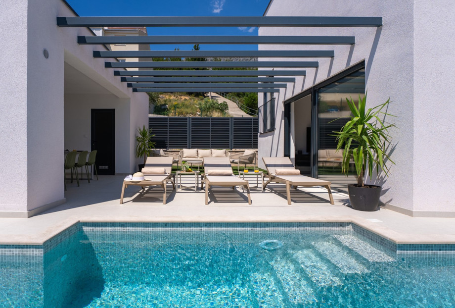 Soak up the sun on the deck chairs surrounding the private 7 meter by 3 meter heated pool.