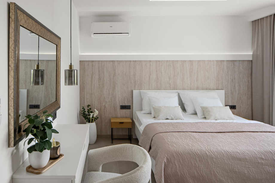 Bedroom No. 2 (14.5 sqm): Includes a king-size bed (180 cm x 200 cm), a TV, A/C, and views of the sea and mountains
