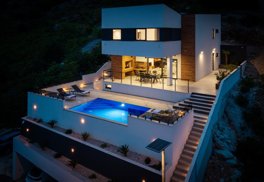 This fully air-conditioned villa features four spacious bedrooms, free WiFi, and a generous living area