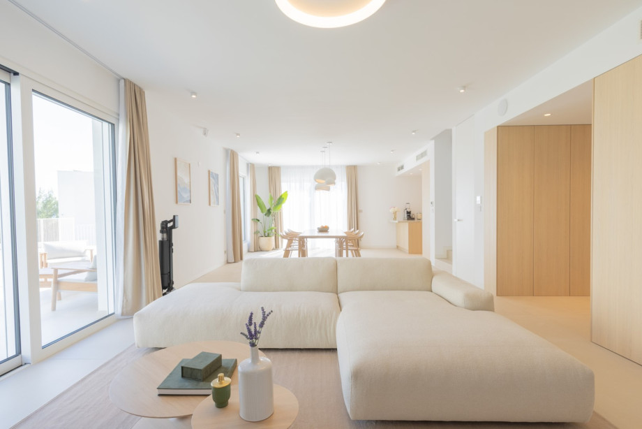 Inside, the villa boasts bright, airy open-plan interiors that seamlessly blend comfort and sophistication
