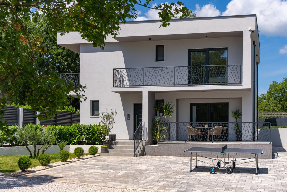 Nestled on a generous 1350 sqm private plot in the tranquil village of Ivanbegovina