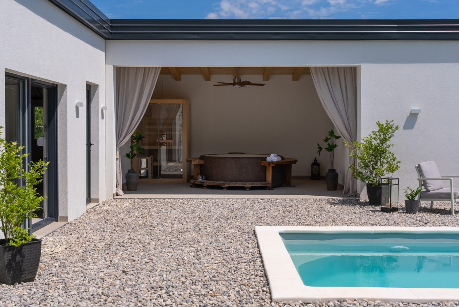 Step into the outdoor oasis, where you'll find a 22.4 sqm private pool measuring 7m x 3.2m.