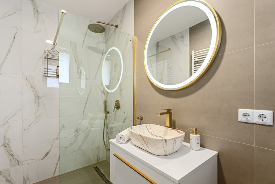 An en-suite bathroom with a shower.