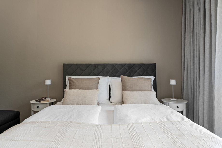 Bedroom 2 features beautiful views of the surrounding nature, creating a calm and comfortable atmosphere.
