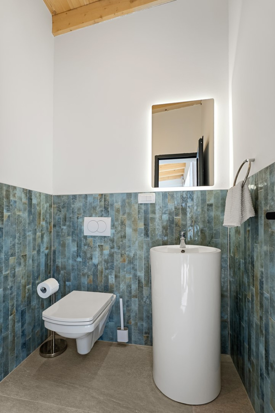 A convenient separate toilet complements this area.