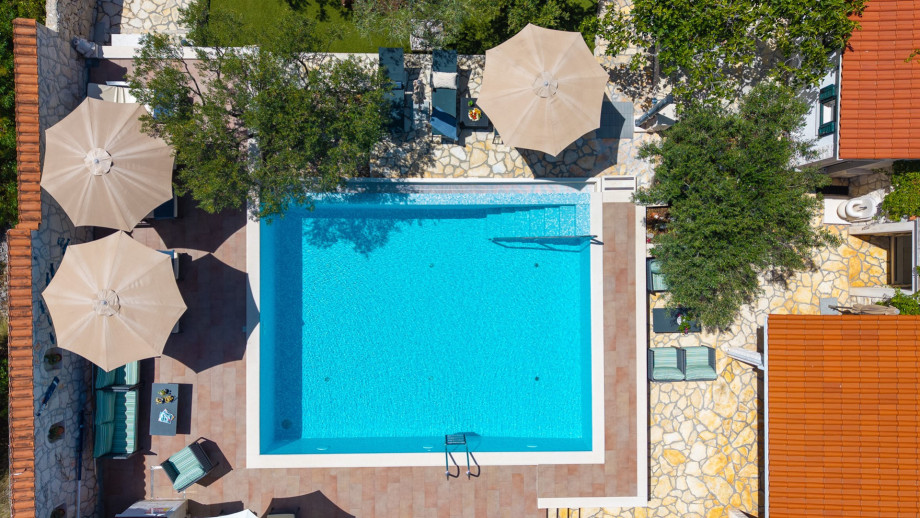 Outdoor pool level featuring a 48 sqm swimming pool and a sun terrace.