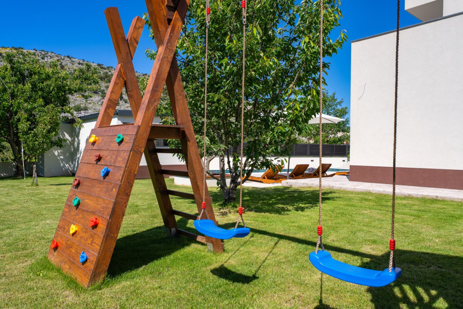 The villa offers a dedicated kids' zone, making it a perfect paradise for families traveling with children.