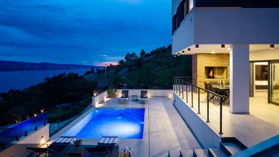 The heated swimming pool is a standout feature, nestled in a quiet location on the slopes of Lokva Rogoznica
