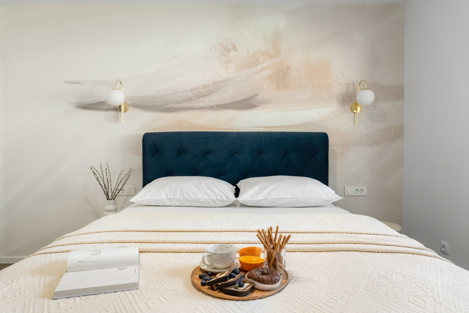 Dieses 30 m2 Schlafzimmer bietet ein Queen-Size-Bett, Klimaanlage und TV.