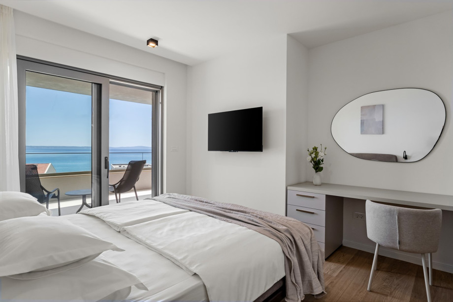 Room spans 16.4 sqm and includes a flat-screen TV for entertainment.