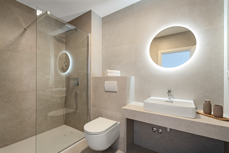 Guests have the convenience of an attached 4.8 sqm en-suite bathroom.