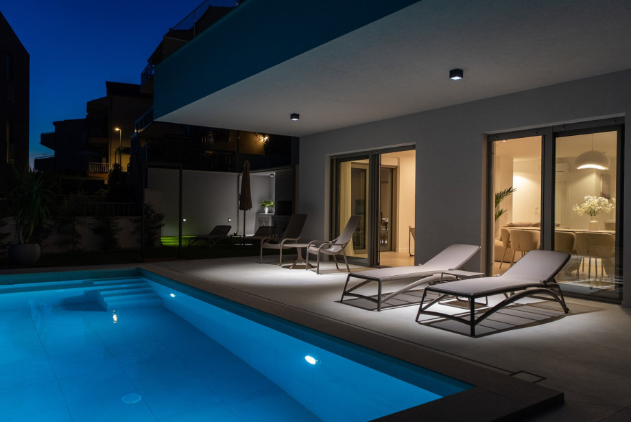 Sun deck offers a comfortable layout with 10 loungers next to the pool.