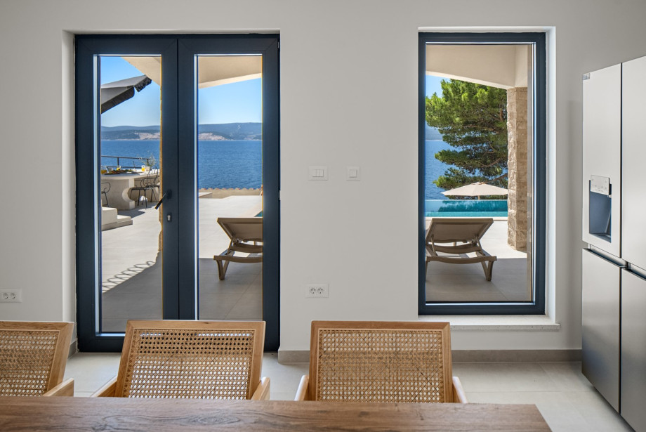 Ground floor layout features a dedicated 24 m2 kitchen and indoor dining space.