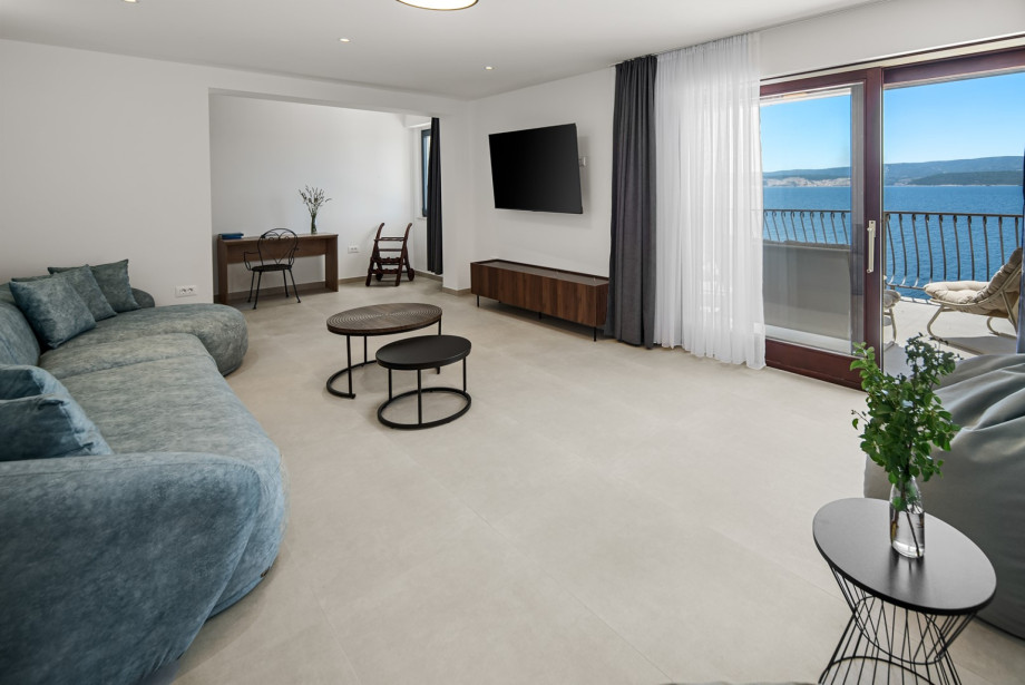 Main living room spans 30 m2 of comfortable indoor lounge space.
