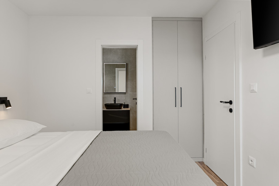 Bedroom No.1. is quipped with independent air conditioning and a flat-screen TV.