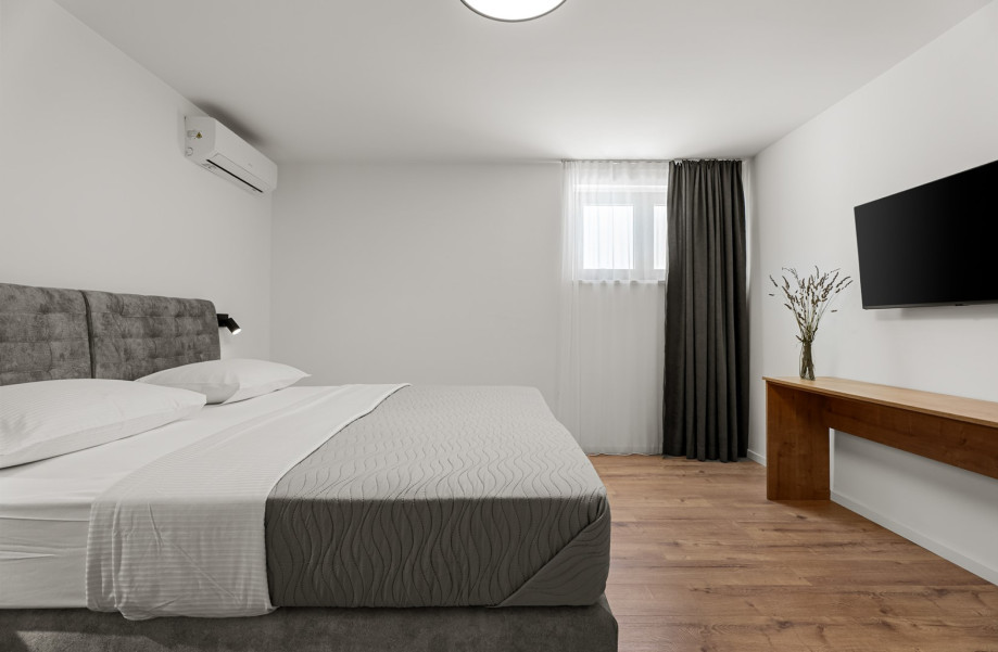 Fully air-conditioned interior includes a private wall-mounted TV.