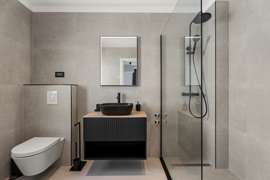 Private en-suite bathroom includes a walk-in shower.