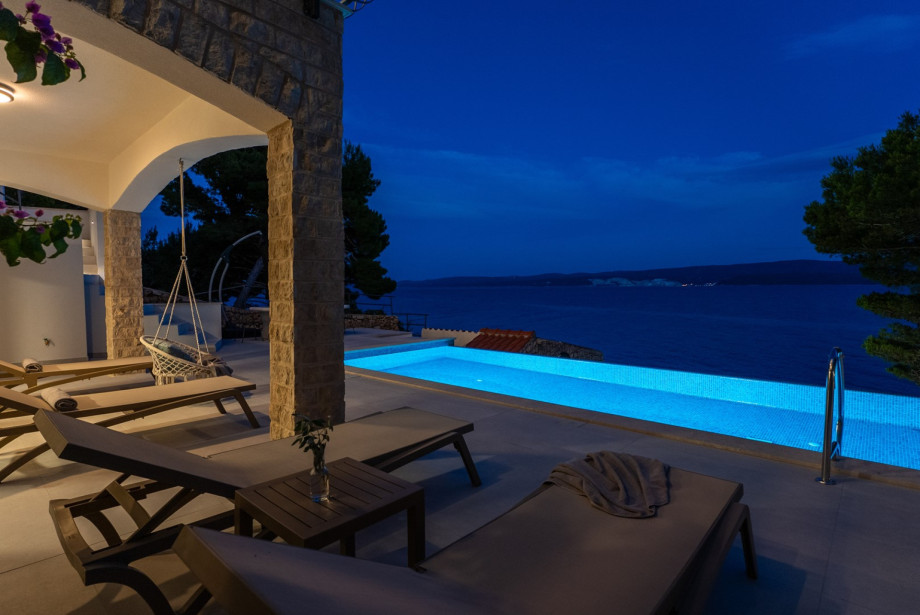 Beachfront Villa Nino features a private heated swimming pool measuring 8 meters by 4 meters.