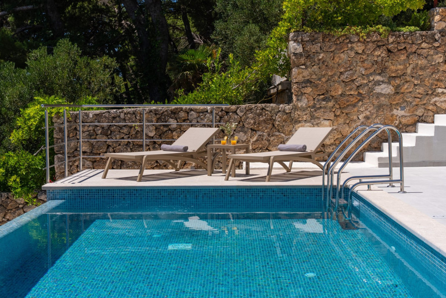 The private swimming pool is heated and features an electrolytic water filtering system.