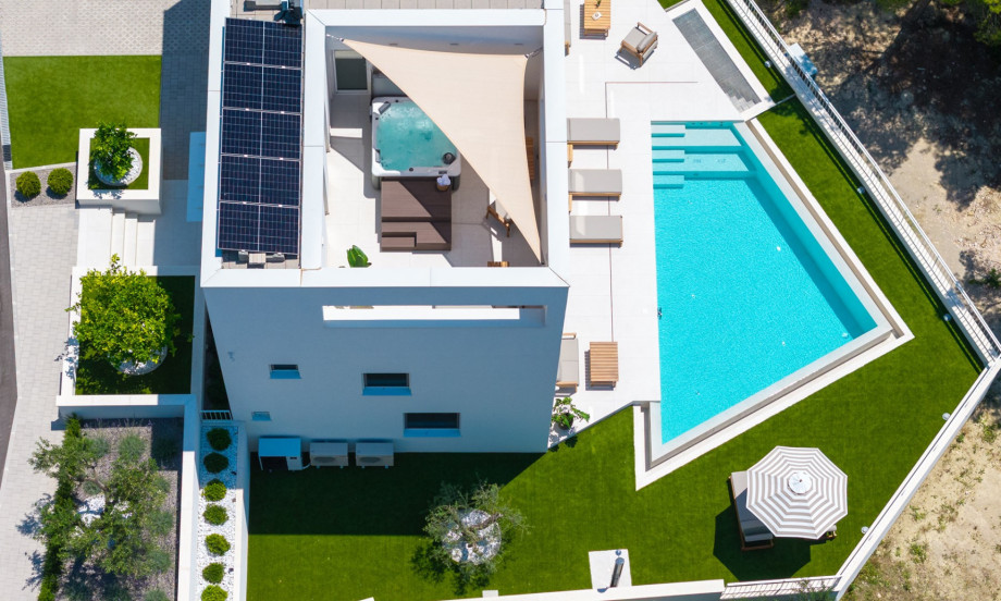 Enjoy a private outdoor pool with a spacious sun terrace, comfortable loungers, and a cozy seating area, this peaceful spot is perfect for relaxing in the sun