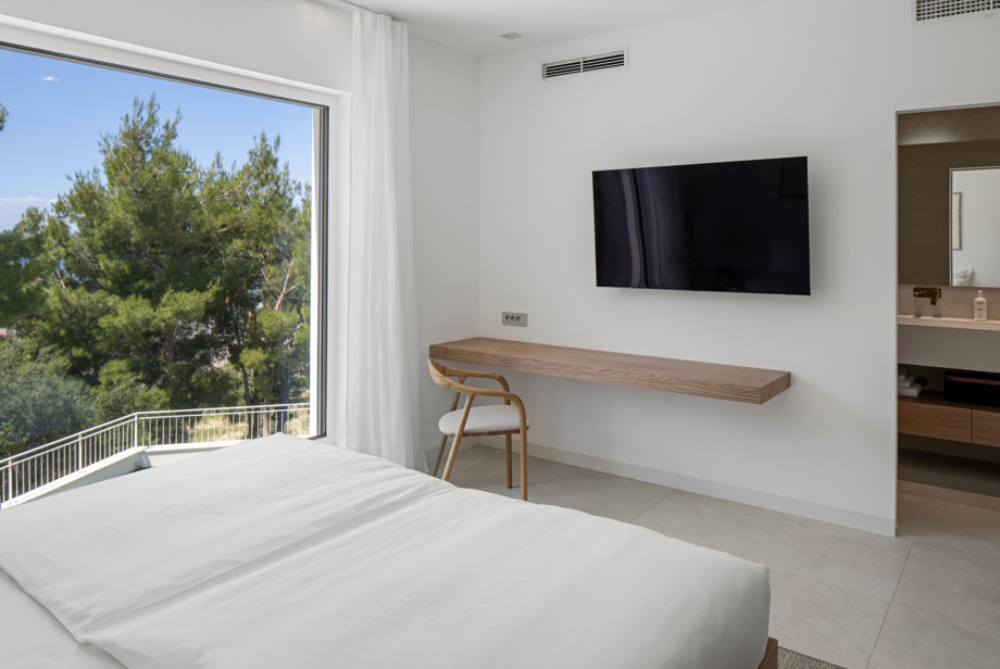 Bedroom No2 also offers a TV, and an A/C