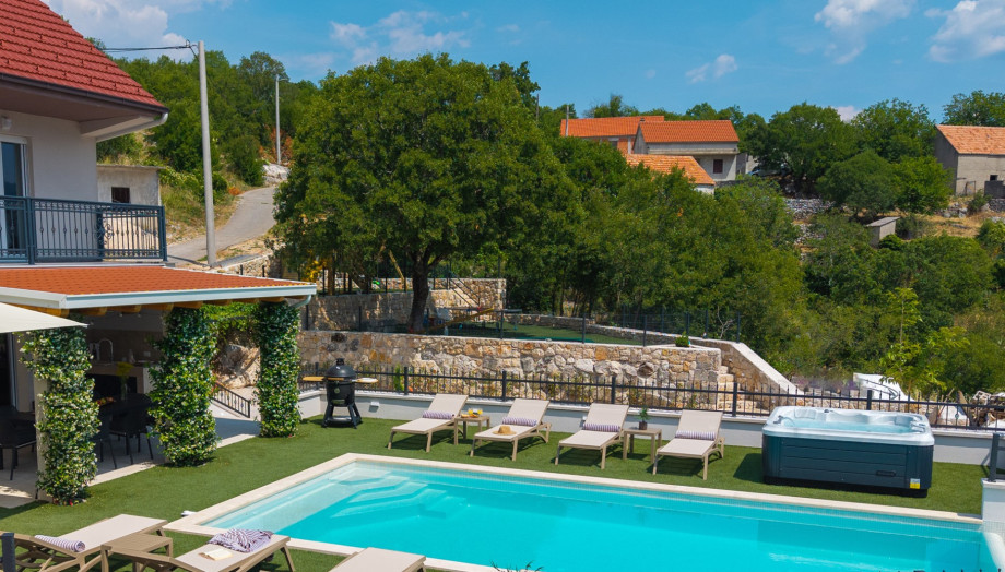 An outdoor shower adds convenience after swimming or outdoor activities.