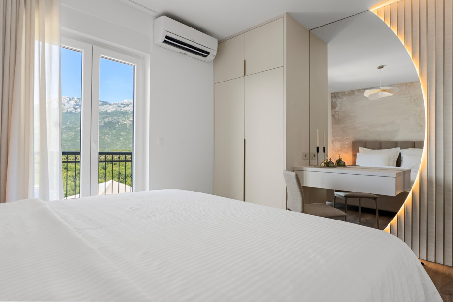 Modernly decorated, air-conditioned bedroom with a family bathroom next to the room