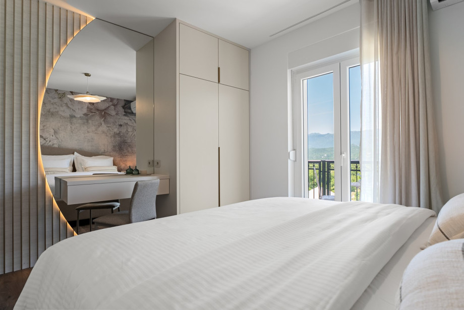 Modernly decorated, air-conditioned bedroom with a family bathroom next to the room