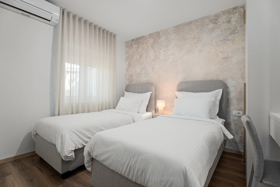 Bedroom No. 4 with two beds measuring 90cm x 200cm