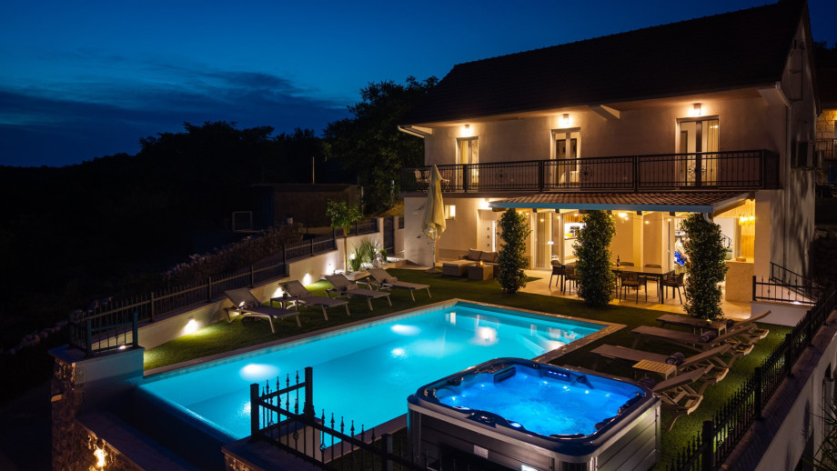 Set on a fenced 950-square-meter private plot, Villa Adrion Terra boasts a variety of outdoor amenities designed for relaxation and entertainment.