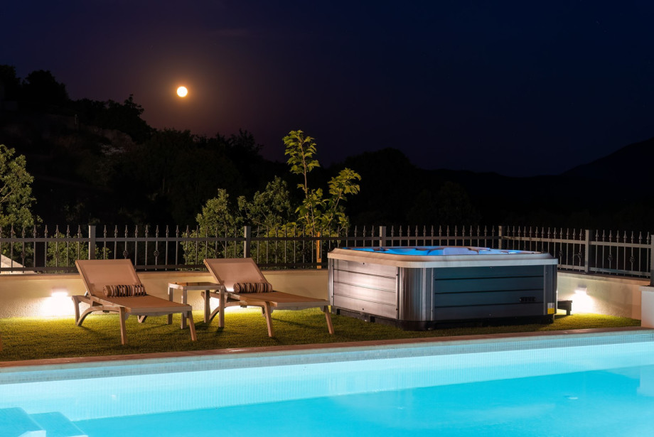 Evening enjoyment by the jacuzzi with family and friends.