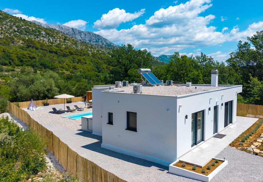 There are 3 parking spaces secured on a private plot, which is monitored by video surveillance at both the parking area and the villa entrance