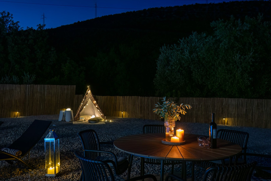 The outdoor area is ideal for a perfect family dinner on a vacation