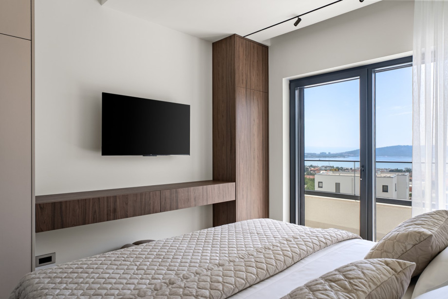 Wake up to breathtaking sea views in a peaceful and elegant bedroom, designed to provide comfort