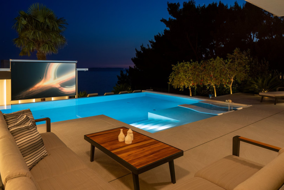 Step outside and discover an outdoor sanctuary designed for sun-drenched relaxation and alfresco living at its fines